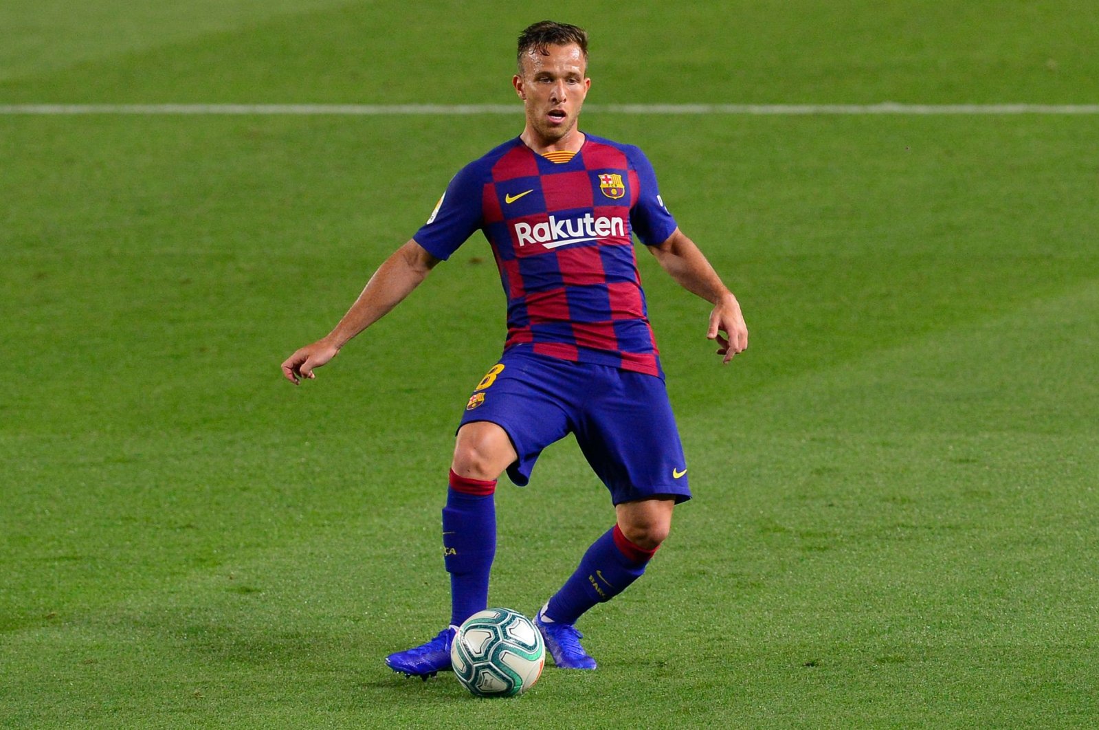 Barcelona's Brazilian midfielder Arthur controls the ball during the Spanish league football match between FC Barcelona and Athletic Club Bilbao at the Camp Nou stadium in Barcelona, Spain, June 23, 2020. (AFP Photo)