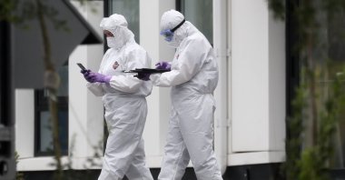 Medical specialists in protective suits wait for patients at the hospital complex for patients with the COVID-19 disease in the Kommunarka settlement in New Moscow, Russia, July 14, 2020. ( EPA-EFE Photo)