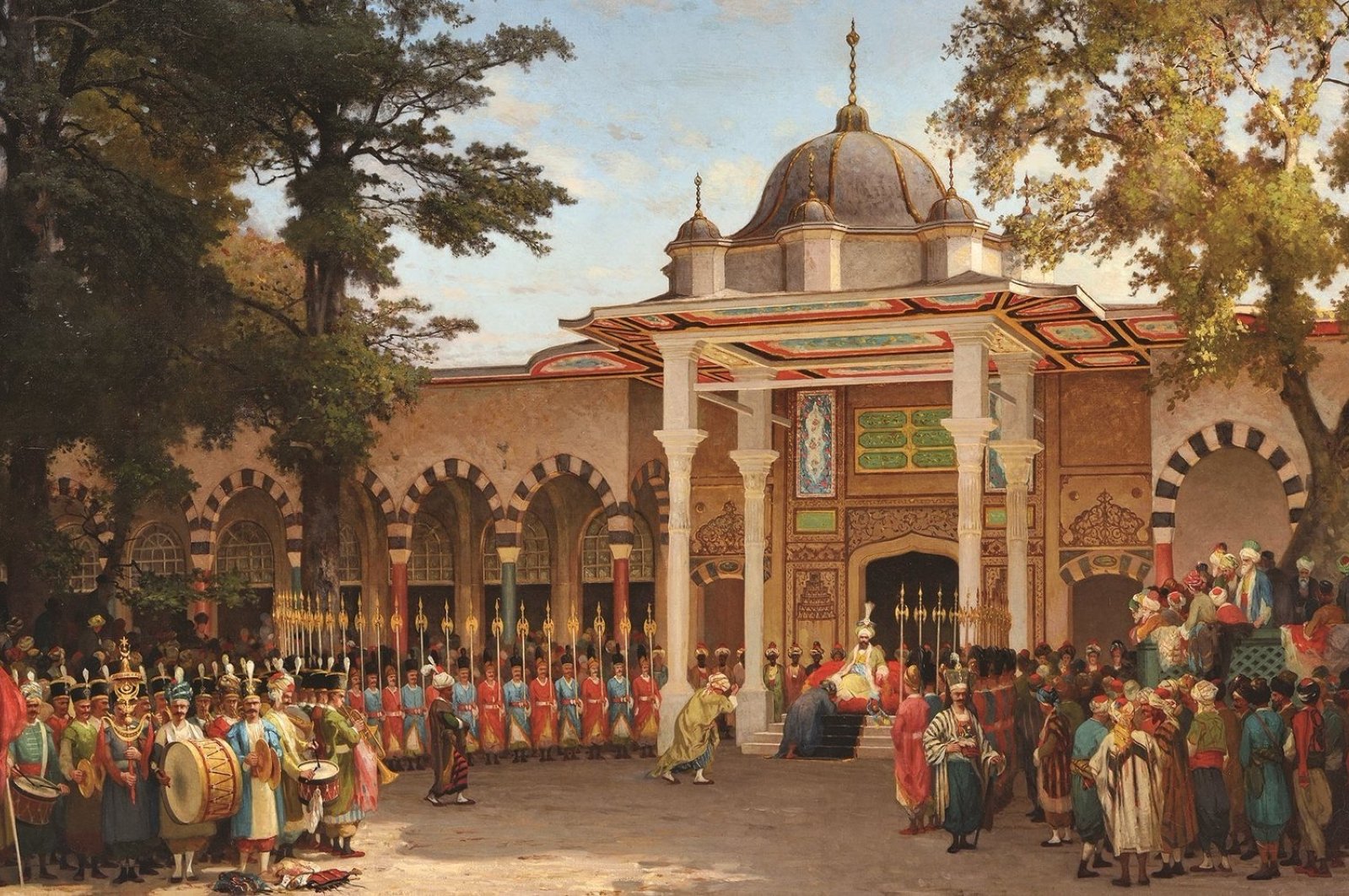 Germain Fabius Brest depicts a reception held in front of the Gate of Felicity in the second courtyard of Topkapı Palace in his 1865 painting “Bayram Greetings Reception."
