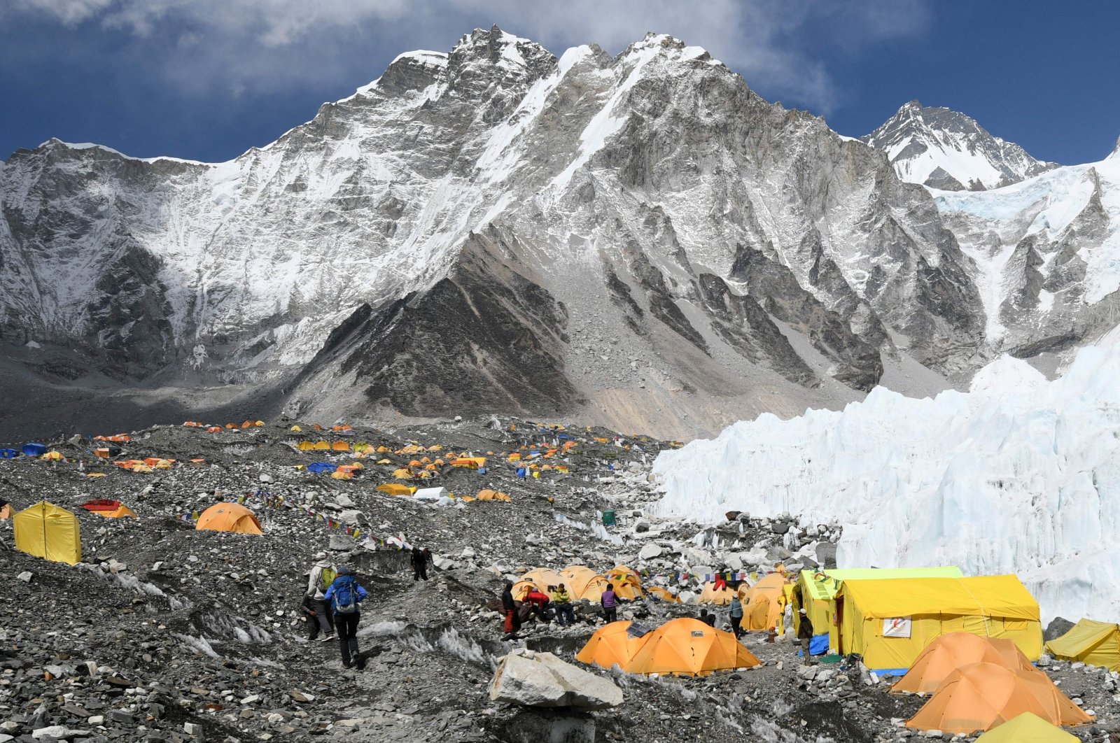  In this file photo taken on April 23, 2018, climbers and porters are seen by their tents at Everest base camp, some 140 kilometres northeast of Kathmandu. (AFP Photo)