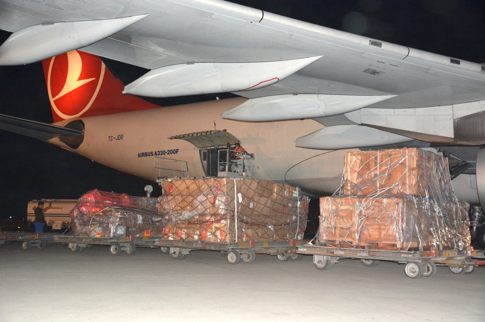The aid bound for Uzbekistan being loaded onto a Turkish Airlines plane in Ankara, Turkey, July 31, 2020. (AA Photo)
