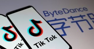 TikTok logos are seen on smartphones in front of a displayed ByteDance logo in this illustration taken November 27, 2019. (REUTERS Photo)
