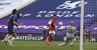 Arsenal's Pierre-Emerick Aubameyang scores his side's second goal during the FA Cup final soccer match between Arsenal and Chelsea at Wembley stadium in London, England, Saturday, Aug. 1, 2020. (AP Photo)