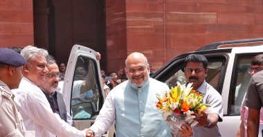 India's newly appointed Home Minister Amit Shah receives a flower bouquet upon his arrival at the home ministry in New Delhi, India, June 1, 2019. (REUTERS Photo)