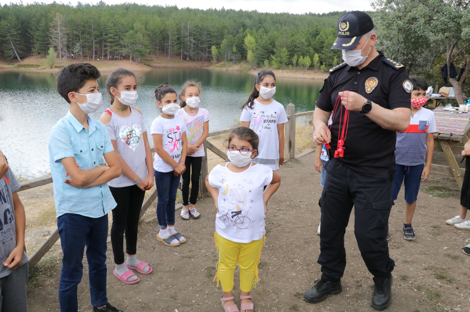 Police officers take part in a program to raise awareness about the coronavirus pandemic in central Yozgat province, Turkey, Aug. 2, 2020. (AA Photo)