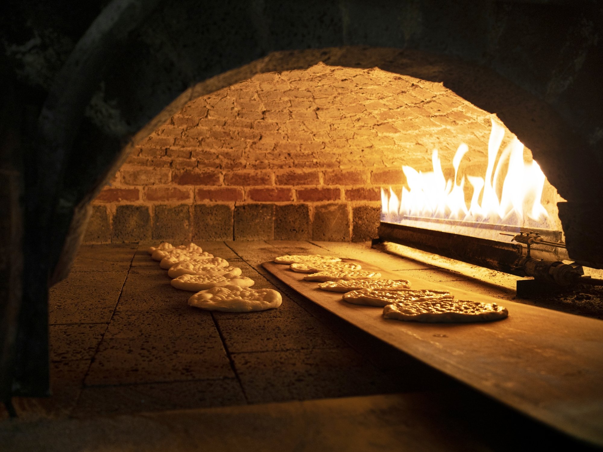 Baking Bread in a Traditional Wood Fired Bread Oven