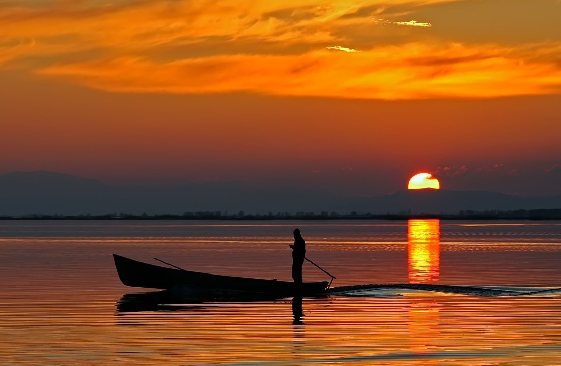 Take some amazing sunset photos at Lake Işıklı while enjoying a boat ride. (AA Photo)