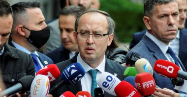 Kosovo Prime Minister Avdullah Hoti talks to members of the media outside the parliament building in Pristina, Kosovo, June 3, 2020. (Reuters Photo)