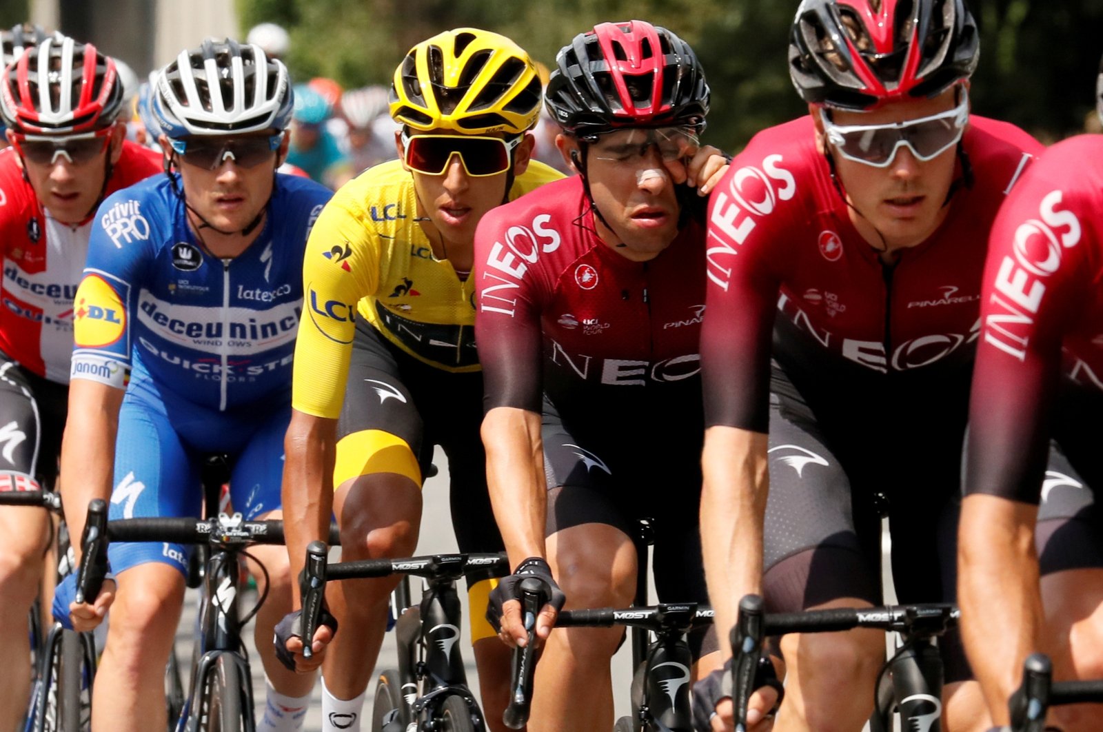 Team INEOS rider Egan Bernal, wearing the overall leader's yellow jersey, in the peloton during Tour de France, near Val Thorens, France, July 27, 2019. (Reuters Photo)