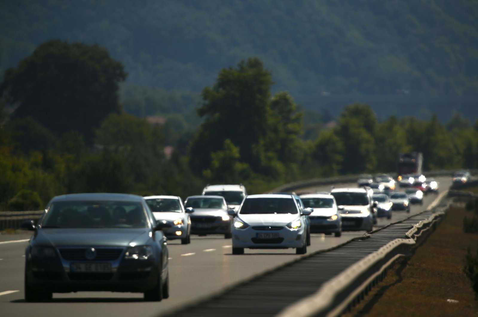 Cars are seen on the Düzce-Bolu section of the Anatolian Highway, northwestern Turkey, Aug. 3, 2020. (AA Photo)


