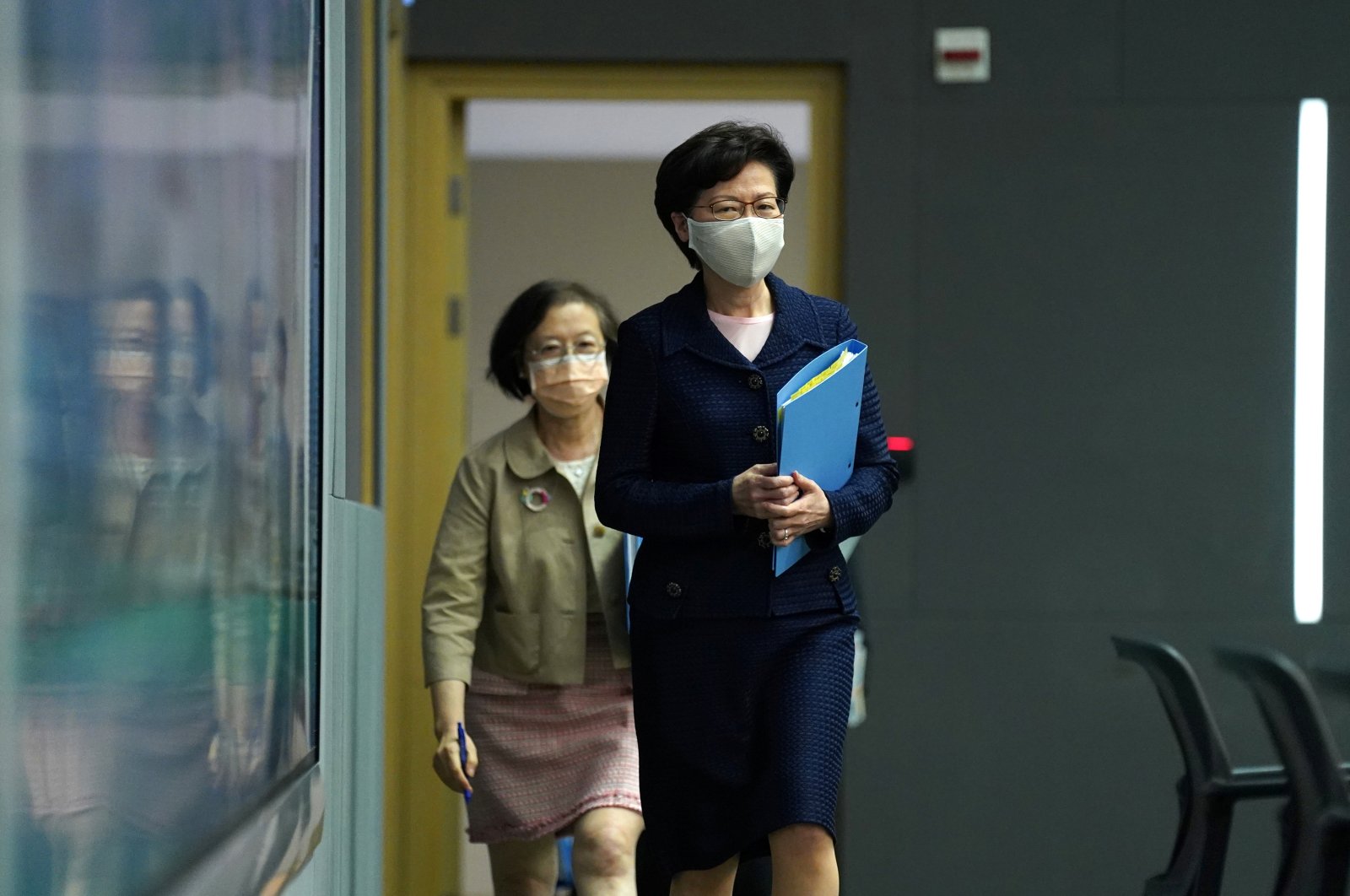 Hong Kong Chief Executive Carrie Lam, wearing a face mask following the coronavirus outbreak, arrives for a news conference in Hong Kong, China, July 31, 2020. (Reuters Photo)