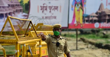 A policeman gestures as he stands at a checkpoint ahead of the ground-breaking ceremony of the proposed Ram Temple in Ayodhya, India, Aug. 4, 2020. (AFP Photo)