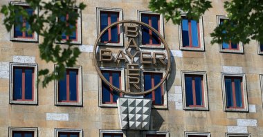 The logo of Bayer AG is pictured at the facade of the historic headquarters of the German pharmaceutical and chemical maker in Leverkusen, Germany, April 27, 2020. (Reuters Photo)