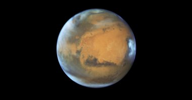 This May 12, 2016 image provided by NASA shows the planet Mars. (NASA/ESA/Hubble Heritage Team - STScI/AURA, J. Bell - ASU, M. Wolff - Space Science Institute via AP)