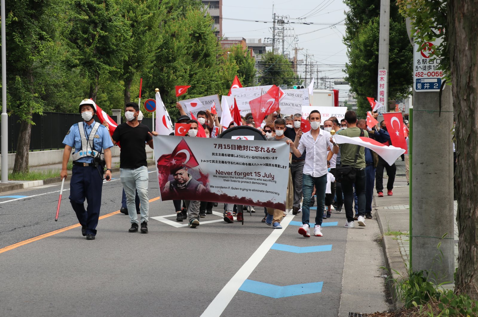 People demonstrate in front of the Enishi International School (EIS), which is linked to the Gülenist Terror Group (FETÖ), in central Nagoya, Japan, Aug. 4, 2020. (AA Photo)
