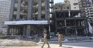 Lebanese soldiers walk past damaged buildings in the aftermath of a massive explosion in Beirut, Lebanon, Aug. 5, 2020. (EPA-EFE Photo)