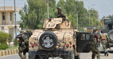 Afghan soldiers arrive in a Humvee vehicle outside a prison during a raid in Jalalabad, Afghanistan, Aug. 3, 2020. (AFP Photo)