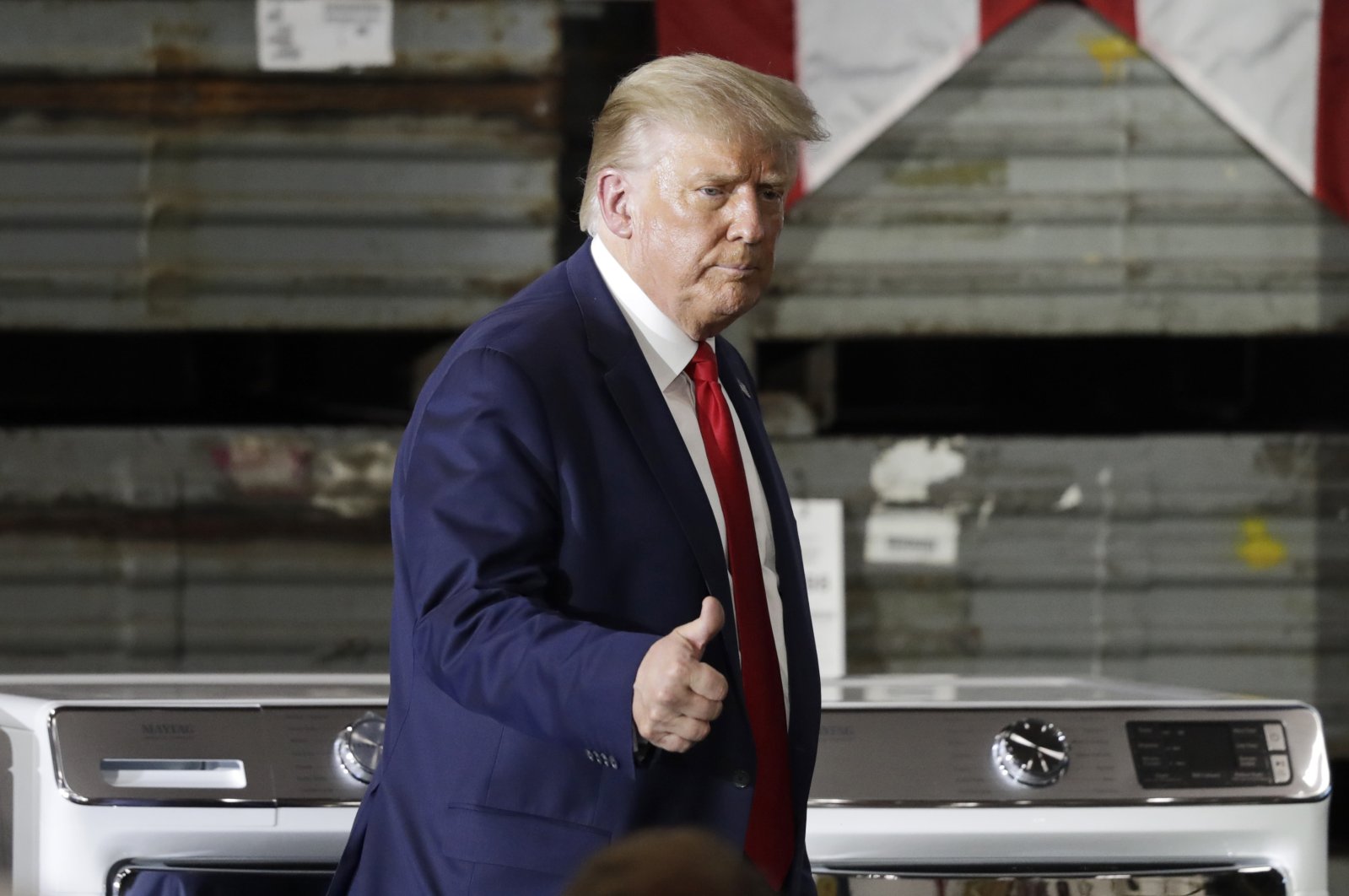 President Donald Trump gives a thumbs up after speaking during an event at the Whirlpool Corporation Manufacturing Plant, Aug. 6, 2020, in Clyde, Ohio. (AP Photo)