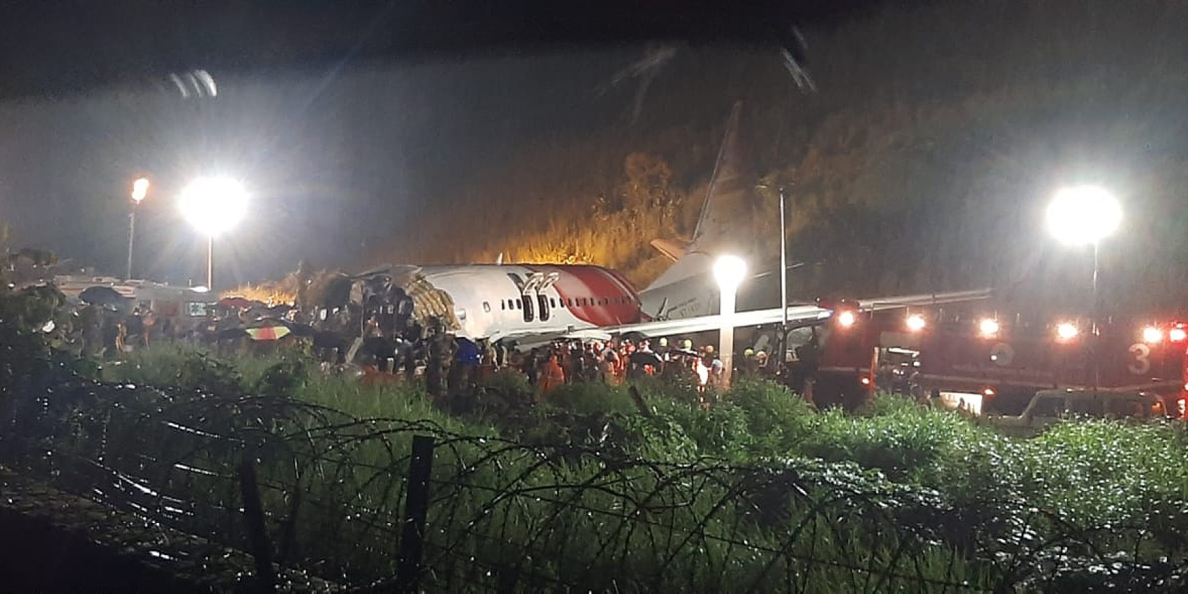 At least 18 dead, dozens injured as Air India Express plane crash lands