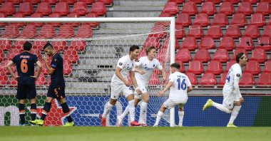 Başakşehir players look dejected as Copenhagen players celebrate scoring a goal during a UEFA Europa League match in Copenhagen, Denmark, Aug. 5, 2020. (EPA Photo)