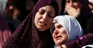 Relatives of Palestinian Dalia Smoudi, 23, mourn during her funeral in Jenin in the Israeli-occupied West Bank, Palestine, Aug. 7, 2020. (Reuters Photo)