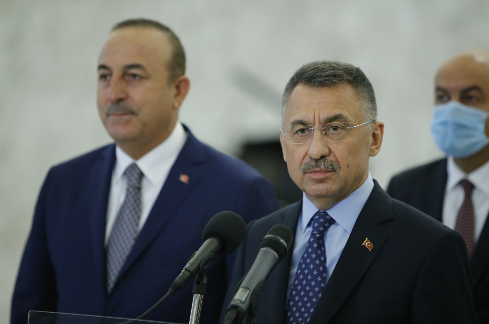 Vice President Fuat Oktay (R) and Foreign Minister Mevlüt Çavuşoğlu (L) take questions at a press conference after their meeting with Lebanese President Michel Aoun in Beirut, Lebanon on Aug. 8, 2020. (AA Photo)