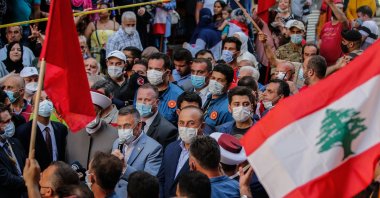 Turkey's Vice President Fuat Oktay and Foreign Minister Mevlüt Çavuşoğlu are seen encircled by an enthusiastic crowd in Beirut, Lebanon, Aug. 8, 2020 (AA Photo)
