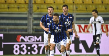 Atalanta's Alejandro Gomez (C) celebrates after a goal against Parma, in Parma, Italy, Jul. 28, 2020. (AP Photo) 