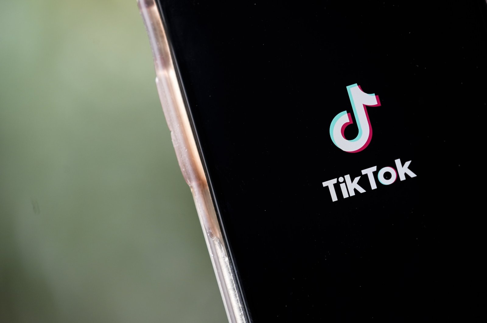 The TikTok app is displayed on a screen of a phone in this file photo taken Aug. 7, 2020. (AFP Photo)