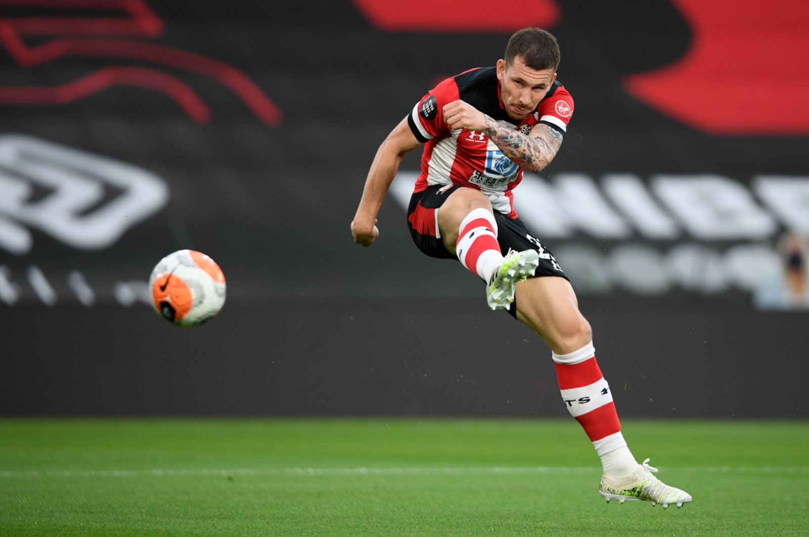 Pierre-Emile Hojbjerg shoots during a Premier League match between Southampton and Brighton in Southampton, England, July 16, 2020. (AFP Photo)