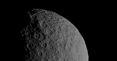 Occator Crater and Ahuna Mons appear together in this view of the dwarf planet Ceres obtained by NASA's Dawn spacecraft on Feb. 11, 2017. (NASA/JPL-Caltech/UCLA/MPS/DLR/IDA handout via Reuters)