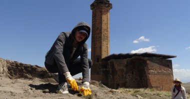 A young man is seen at the excavation site at Ebu'l Manuçehr Mosque, Kars, eastern Turkey.