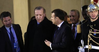 President Recep Tayyip Erdoğan and French President Emmanuel Macron talk after a meeting on bilateral relations at the Elysee Palace in Paris, Jan. 5, 2018. (AP Photo)