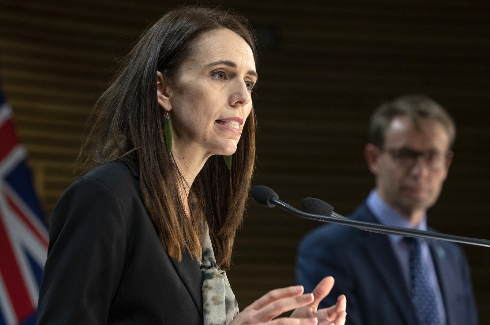 New Zealand Prime Minister Jacinda Ardern (L), and Director of Health Ashley Bloomfield address a press conference in Wellington, New Zealand, Aug. 12, 2020. (AP Photo)