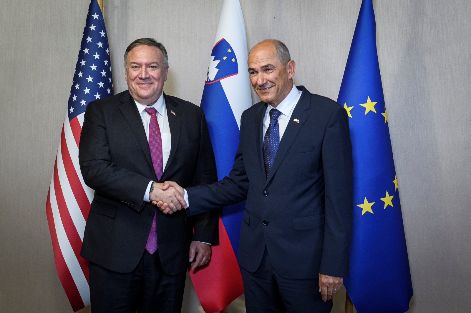 Slovenian Prime Minister Janez Jansa (R) shakes hands with U.S. Secretary of State Mike Pompeo ahead of their meeting in Bled, Slovenia, during Pompeo's four-nation visit to Central Europe, Aug. 13, 2020. (Reuters Photo)