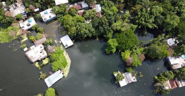 An aerial view shows a flooded residential area due to recent monsoon rainfalls, Dhamrai, Aug. 11, 2020. (AFP Photo)