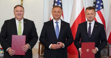 (L-R) US Secretary of State Mike Pompeo, Polish President Andrzej Duda and Polish Minister of Defence Mariusz Blaszczak pose for a picture after they signed the US-Poland Enhanced Defence Cooperation Agreement in the Presidential Palace in Warsaw, Poland, on August 15, 2020. (AFP Photo)