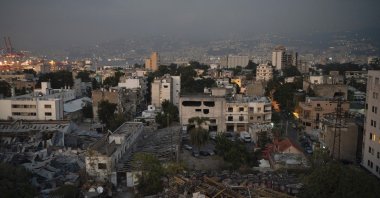 Damaged buildings are seen near the site of last week's massive explosion in the port of Beirut, Lebanon, Friday, Aug. 14, 2020. (AP Photo)