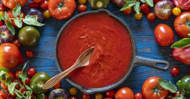 Don't let those fragrant and juicy summer tomatoes go to waste, so get preserving to enjoy them year-round. (iStock Photo)