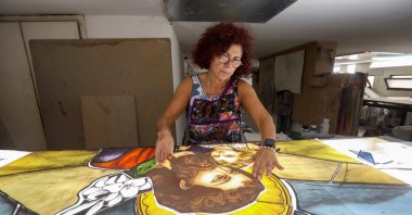 Stained glass maker Maya Husseini works inside her workshop in Hazmiyeh, Lebanon on Aug. 13, 2020. (Reuters Photo)