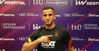 Omar Elabdellaoui poses with Galatasaray jersey after the signing in Istanbul, Turkey, Aug. 17, 2020. (AA Photo)
