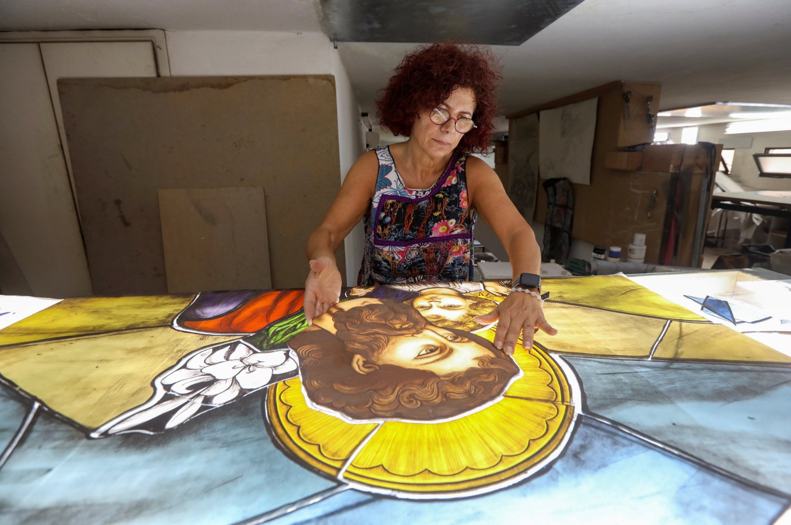 Stained glass maker Maya Husseini works inside her workshop in Hazmiyeh, Lebanon on Aug. 13, 2020. (Reuters Photo)