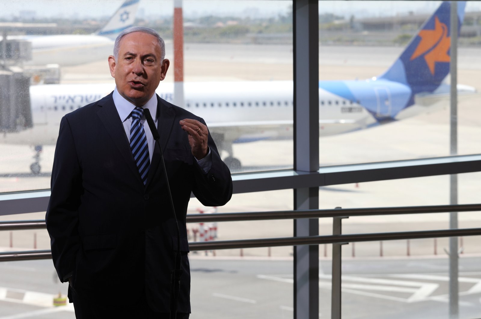 Israeli Prime Minister Benjamin Netanyahu gestures as he gives a statement at Ben Gurion International Airport, in Lod, near Tel Aviv, Israel, Aug. 17, 2020. (Reuters Photo)