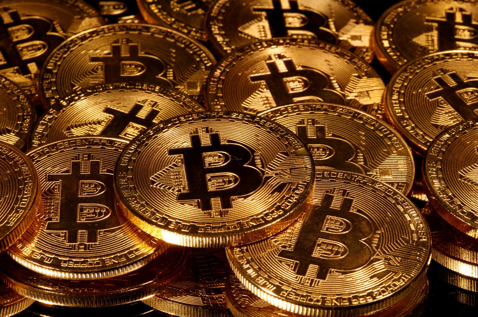 Representations of the virtual currency Bitcoin are seen in this picture illustration taken March 13, 2020. (Reuters Photo)
