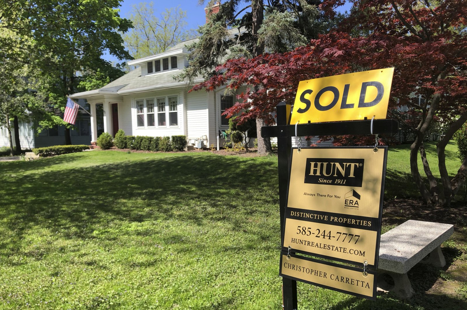A sold sign sits in front of a house in Brighton, N.Y., United States, May 22, 2020. (AP Photo)
