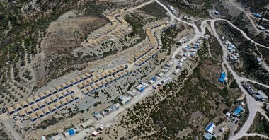 An aerial picture shows a tent camp for internally displaced Syrians in the Khirbet al-Joz area, in the west of the northwestern Idlib province near the border with Turkey, Syria, Aug. 18, 2020. (AFP Photo)