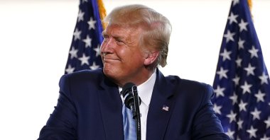 President Donald Trump speaks to a crowd of supporters at the Yuma International Airport in Yuma, Arizona, U.S., Aug. 18, 2020. (AP Photo)