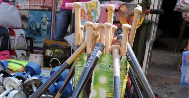 Baseball bats on display outside a shop in Adana, southern Turkey, Aug. 20, 2020. (DHA Photo) 