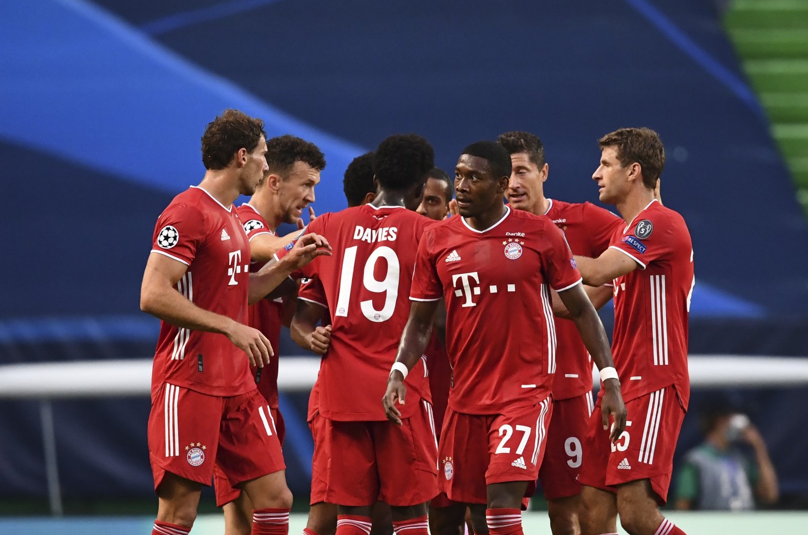 Bayern players celebrate their side's opening goal against Lyon during the Champions League semifinal at the Jose Alvalade stadium in Lisbon, Portugal, Aug. 19, 2020. (AP Photo)
