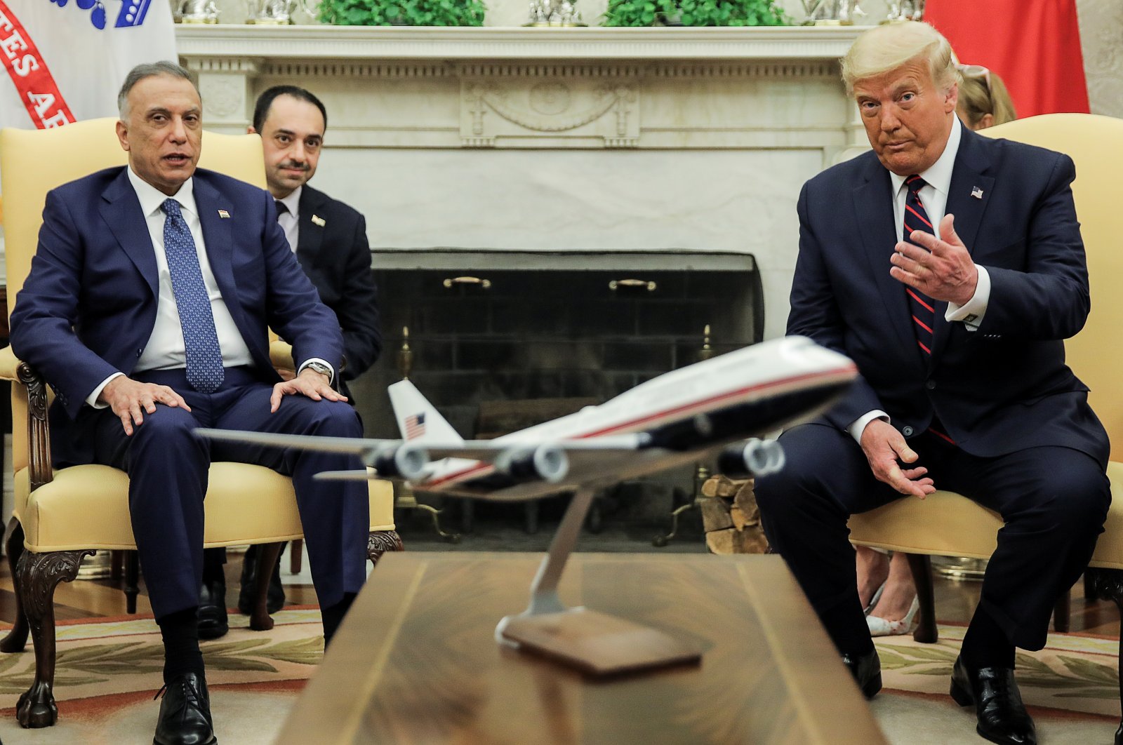 U.S. President Donald Trump speaks with Iraq's Prime Minister Mustafa al-Kadhimi as a translator listens in the Oval Office at the White House in Washington, August 20, 2020. (REUTERS Photo)